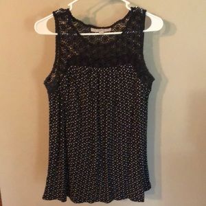 Navy and polka dot blouse.